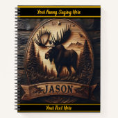Moose carving in beboste bergen notitieboek (Voorkant)