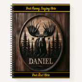 Moose carving in beboste bergen notitieboek (Voorkant)