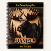 Moose carving te midden van bosschaduwen notitieboek (Voorkant)