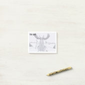 Moose dat wordt vastgehouden in een doek vol wasgo post-it® notes (Op bureau)