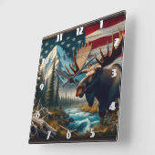 Moose in de buurt van de rivier met bergen en vlag vierkante klok (Hoek)