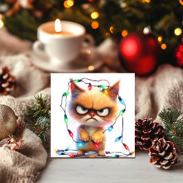 Mopperkat verstrikt in kerstverlichting feestdagenkaart