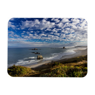Morning clouds and fog at the beach magneet