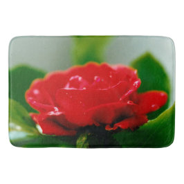 Morning red Rose bedekt met dauwdruppels Badmat