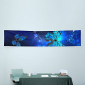 Morpho Butterfly in de donkere achtergrond Spandoek (Beurs)
