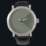Moss Green Diagonal horloge<br><div class="desc">Maak indruk met dit slanke Moss Green Diagonal-horloge - waar moderne kleurtheorie voldoet aan minimalistisch ontwerp. Met een subtiele diagonale verdeling, de ene zijde mat en de andere gespikkeld, vangt dit uurwerk balans en beweging in een enkele blik. De aardse maar verfijnde toon maakt het ideaal voor zowel professionele als...</div>