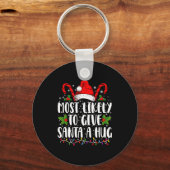 Most Likely To Give Santa A Hug Ing Family Xmas Sleutelhanger (Voorkant)