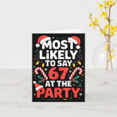 Most Likely To Say 67 At The Party Funny Christmas Kaart (Gele Bloem)