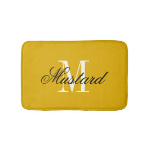 Mosterdgele badmat met elegante naammonogram