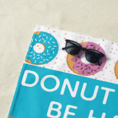 Motivatie citaat kleurrijke donuts strandlaken (In situ)