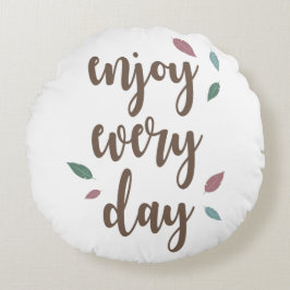 Motivatie citaat veer kalligrafietekst rond kussen