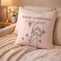 Motivatiekussen met 'Inhale Confidence' op roze ku