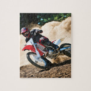 Motocross rijder gooit kussen legpuzzel