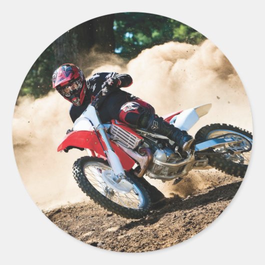 Motocross rijder gooit kussen ronde sticker (Voorkant)