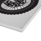 Motorfiets met rode vuilniswagen snijplank (Hoek)