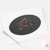 MOTORFIETS OP KOOLSTOFVEZEL. OVALE STICKER (Envelop)