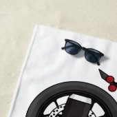 Motorrijwiel met wolkruisstijl strandlaken (In situ)