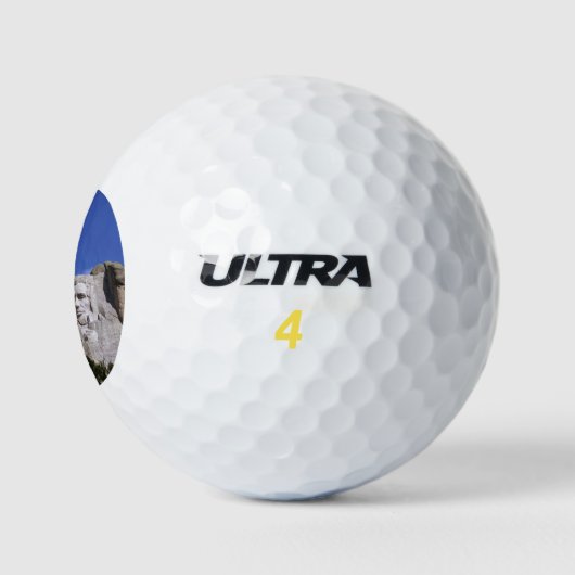 MOUNT RUSHMORE GOLFBALLEN (Logo)
