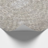 Mousserend water op strandzand en verpakkingspapie cadeaupapier (Hoek)