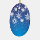 Mousserende snuitvlokken op blauw keramisch ornament (Links)