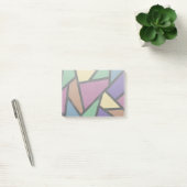 Mozaïekpatroon van gestreepte regenboogkleuren post-it® notes (Kantoor)
