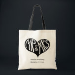 Mr en Mrs Black Heart Shape Wedding Tote Bag<br><div class="desc">Voeg een leuke aanraking toe aan je bruiloft met deze gepersonaliseerde canvas tassen. In het midden staat een vette afbeelding met "Mr & Mrs." in handgetekende letters in een zwarte hartvorm. Deze partijbenodigdheden zijn klaar om gepersonaliseerd te worden met de naam van de bruid en bruom en hun trouwdatum.</div>