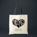 Mr en Mrs Black Heart Shape Wedding Tote Bag<br><div class="desc">Voeg een leuke aanraking toe aan je bruiloft met deze gepersonaliseerde canvas tassen. In het midden staat een vette afbeelding met "Mr & Mrs." in handgetekende letters in een zwarte hartvorm. Deze partijbenodigdheden zijn klaar om gepersonaliseerd te worden met de naam van de bruid en bruom en hun trouwdatum.</div>