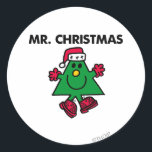 Mr. Kerstmis | Festive Pet & handschoenen Ronde Sticker<br><div class="desc">Het is moeilijk om niet van de feestdagen te houden als Mr. Kerstmis met je komt vieren! Als een kerstboom met een groene tint, is dit personage van Mr. Mannen klaar om een feestelijke vrolijkheid te verspreiden. Creëer wat leuke kerstcadeautjes met dit ontwerp om onze geweldige producten aan te passen....</div>