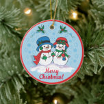 Mr. & Mrs Frosty The Snowman Ceramic Ornament<br><div class="desc">Pas deze unieke kerstversiering aan! Mr. En Mrs Frosty The Snowman die hun kerstPetten droeg,  Ear Muffs and Scarves nemen een magische kerstrol door een "Snowy Winter Wonderland"! Originele Kunstschilders van artiest Kerry Miller.</div>