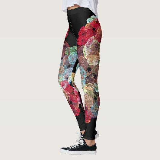 Multi kleur spatten op zwarte achtergrond leggings (Links)