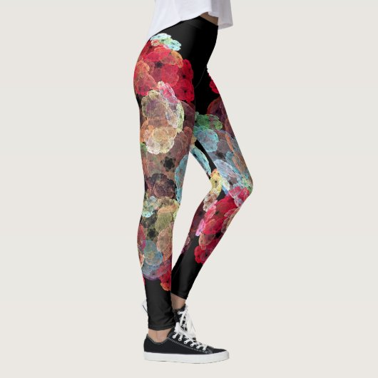 Multi kleur spatten op zwarte achtergrond leggings (Rechts)