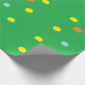 Multicolorcirkels op groen cadeaupapier (Hoek)