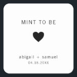 Munt om Modern Black en White Wedding Favor te zij Vierkante Sticker<br><div class="desc">De moderne bruiloft begunstigt stickers met een minimaal design met de boodschap "Mint To Be" met een hart en uw namen en datum in zwart-wit, boven een witte achtergrond. De doopvonten en achtergrondkleuren kunnen in om het even welke kleuren worden veranderd u wenst. Deze eenvoudige, hedendaagse stickers zijn ideaal voor...</div>