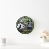 Muscovy Ducks zitten op een bankklok Ronde Klok (Huis)