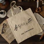 Musical Notes Band of Choir Teacher Custom Music Tote Bag<br><div class="desc">Een coole canvas tas voor muziekleraren met een muzikale staf met notities. Bestel dit gepersonaliseerde cadeau voor een muzikant,  componist,  band of orkestdirigent,  of koorleider en pas het aan met een naam of andere tekst.</div>