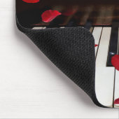 Musical Quote over de Muismat van piano-toetsenbor (Hoek)