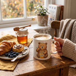 Muts teddybeer die honing eet koffiemok