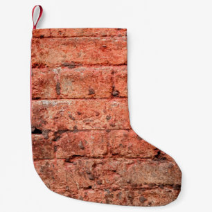  muur met een paar stenen erin, steen kleine kerstsok