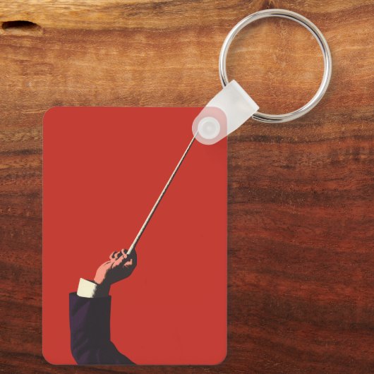  muziek, hand van de geleider die een batterij vas sleutelhanger (Achterkant)