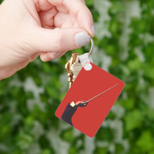  muziek, hand van de geleider die een batterij vas sleutelhanger (Hand)