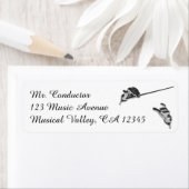  muziek, handen van de geleider met een batterij etiket (Insitu)