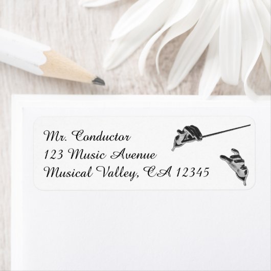 muziek, handen van de geleider met een batterij etiket (Insitu)