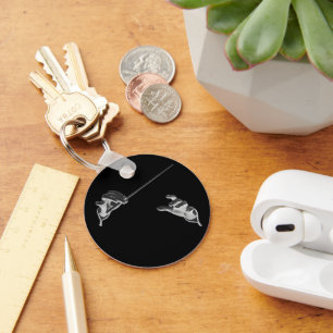  muziek, handen van de geleider met een batterij sleutelhanger