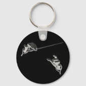 muziek, handen van de geleider met een batterij sleutelhanger (Achterkant)