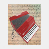Muziek op  vel met een rode cordion fleece deken (Voorkant)