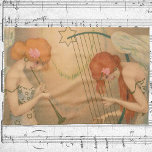 Muziek Victoriaans Angel Musicians Flute Harp Theedoek<br><div class="desc">beeldvormend muzikaal ontwerp met twee prachtige engelen of sprookjesmuzikanten die op verschillende instrumenten muziek spelen door de Victoriaans kunstenaar Raphael Kirchner. c. 1903. De ene engel speelt een houdwind flutflageolet terwijl de andere een gespannen instrument of harp speelt. Een ster is over hun hoofd.</div>