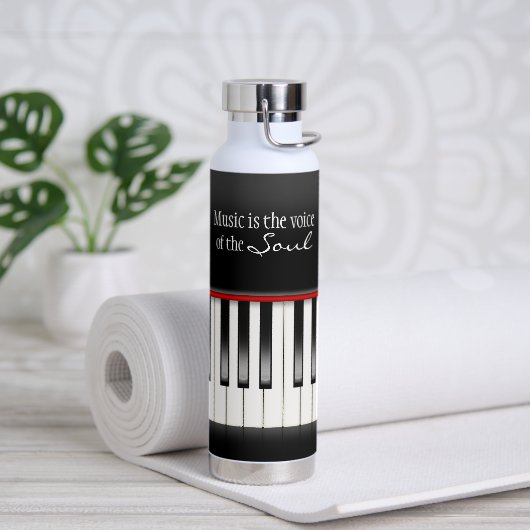 Muziekcitaat op piantoetsenbord waterfles (Yoga)