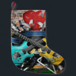 Muziekcollage: Kleurrijke ritmische achtergrond. Kleine Kerstsok<br><div class="desc">Collage van muziek,  kleur en helder muzikaal decor
Collage van muziek,  kleur en vrolijke sfeer.
Muziek,  kleur en blijdschap! Laat deze levendige muziekcollage uw wereld betoveren.
muziek,  muur,  collage,  achtergrond,  auto,  gitaar,  geluid,  systeem,  stad,  drum,  afbeelding,  vintage,  retro,  cassette,  band,  audio,  nostalgie,  recorder,  vierkant,  stereo</div>