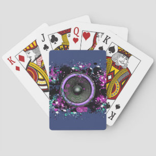 Muziekluidspreker en gesplatterde verf pokerkaarten