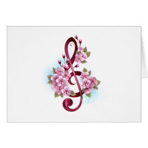 Muzieknotatie in vioolsleutel met Sakura bloemen